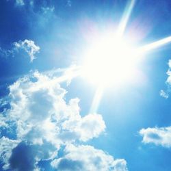 Sun shining through clouds