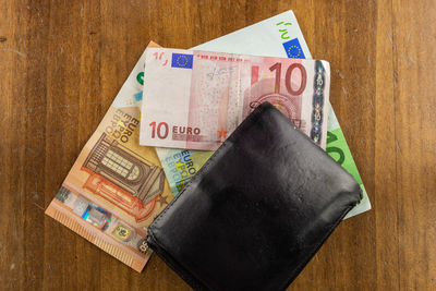 High angle view of information sign on table