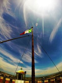 Low angle view of flag against sky