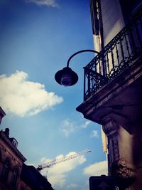 Low angle view of buildings in city against sky