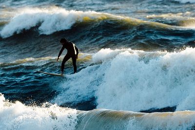 Man surfing in sea