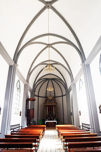 Empty benches in the church