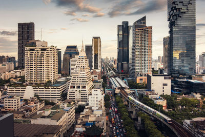 High angle view of buildings in city against sky