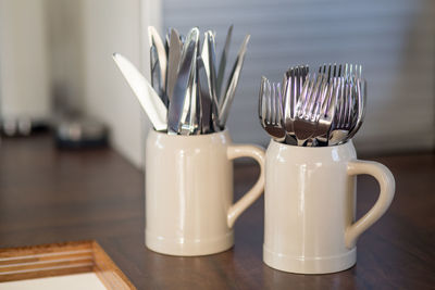 Close-up of glasses on table