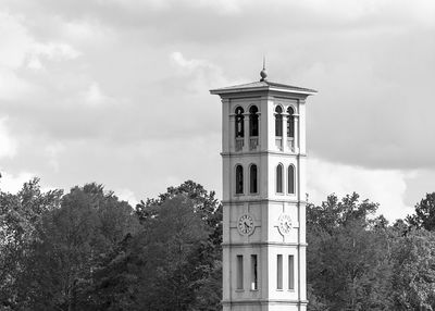 Low angle view of clock tower against sky