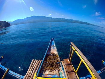 Scenic view of sea against blue sky