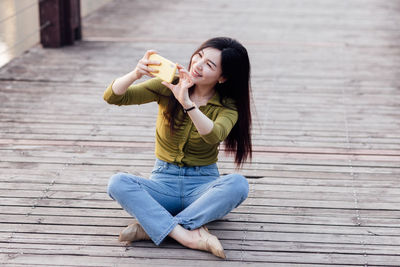 Young woman using mobile phone