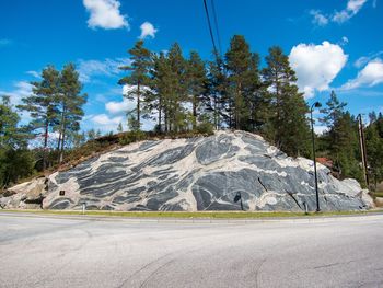 Scenic view of mountain road against sky