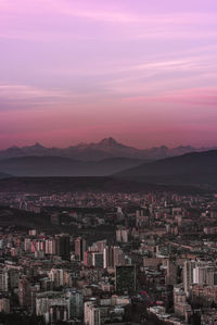 High angle view of townscape against sky during sunset