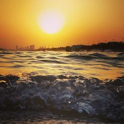 Scenic view of sea at sunset