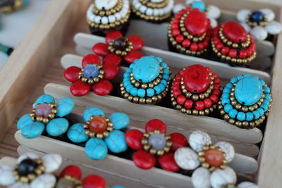 Close-up of jewelries in container