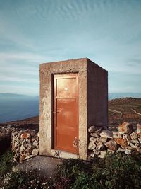 Built structure against sky or narnia in syros