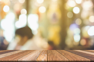 Defocused image of wooden table