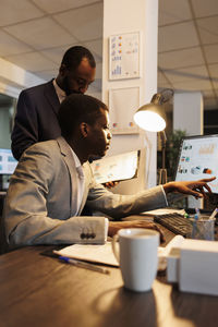 Business colleagues working on table