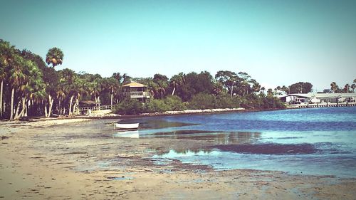 Scenic view of river against clear sky