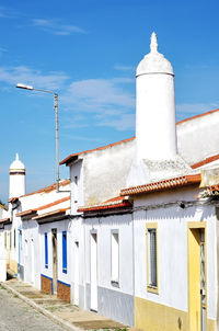 Houses against blue sky