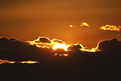 Scenic view of dramatic sky during sunset