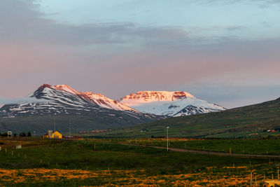 Scenic view of mountains against sky during winter