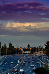 High angle view of traffic on road at sunset