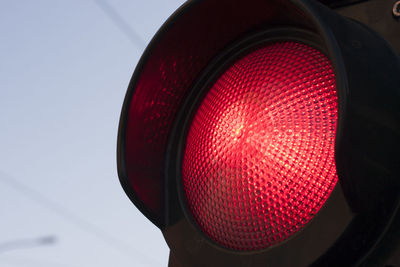 Low angle view of red traffic light