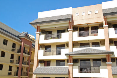 Low angle view of residential building against sky