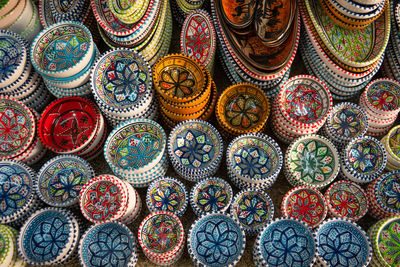 Tunisian ceramic tableware with multicoloured painting for sale in the market.