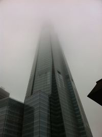 Low angle view of skyscrapers against sky