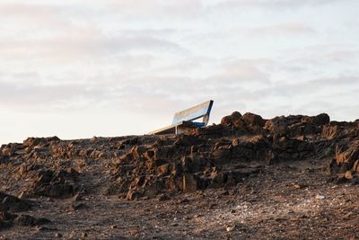 Rock formation on land against sky