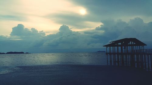 Scenic view of beach against blue sky