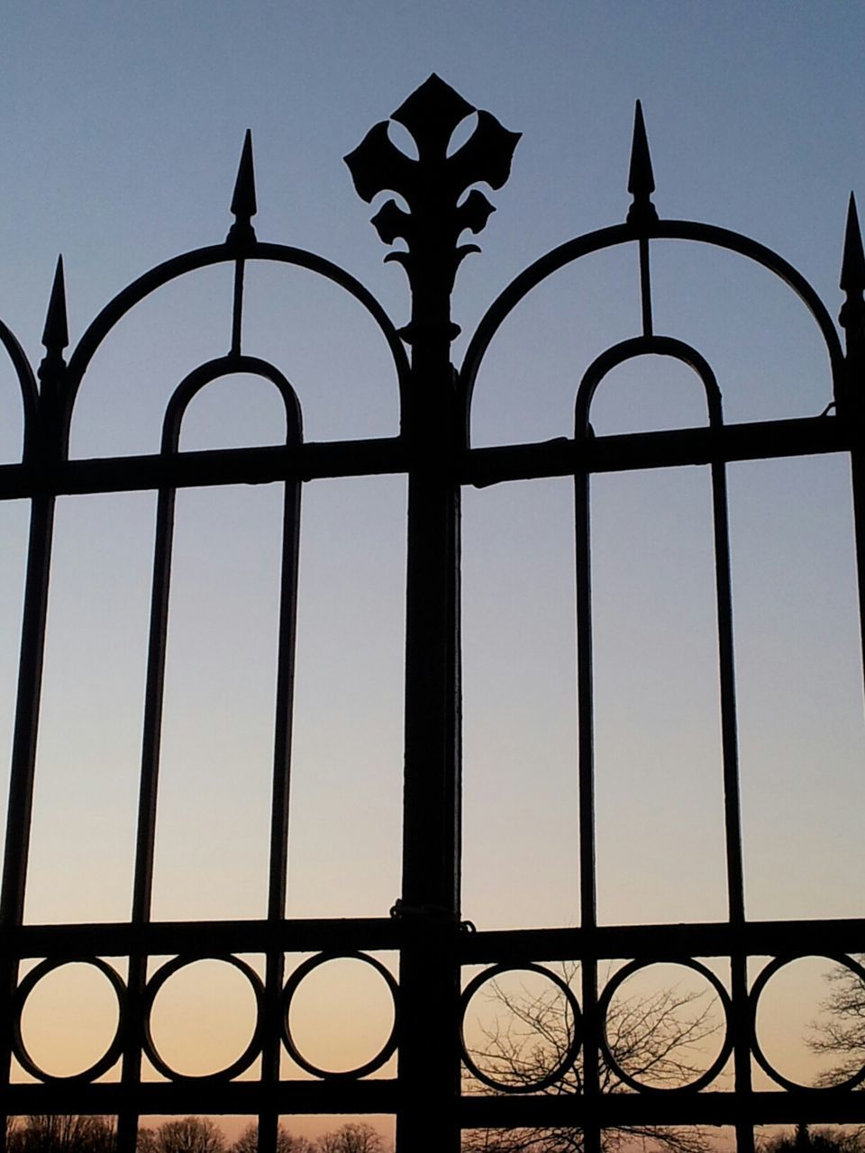 metal, protection, safety, security, fence, clear sky, pattern, metallic, gate, design, chainlink fence, built structure, close-up, silhouette, architecture, sky, outdoors, no people, focus on foreground, day