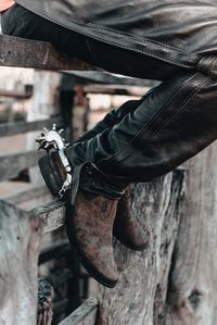 Low section of man on railing