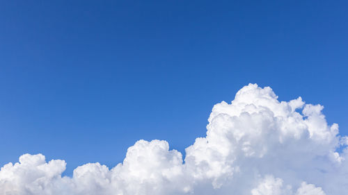 Low angle view of clouds in blue sky