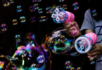 High angle view of woman with bubbles