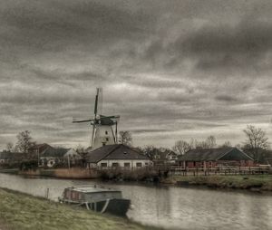 View of river against cloudy sky