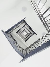 Low angle view of spiral staircase in building