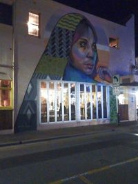 Graffiti on building wall at night