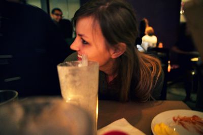 Close-up of girl holding camera