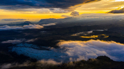 Scenic view of dramatic sky during sunset
