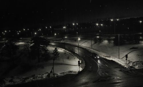 Illuminated street lights at night