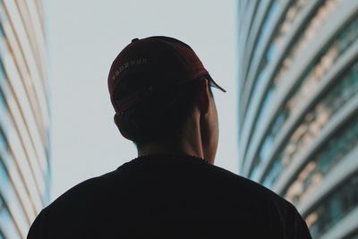 Rear view of man wearing hat