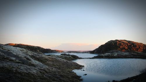 Scenic view of sea at sunset