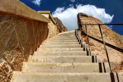 Low angle view of steps against sky