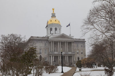 Building against sky during winter