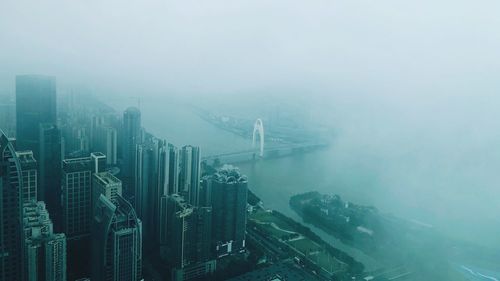 Aerial view of city in foggy weather