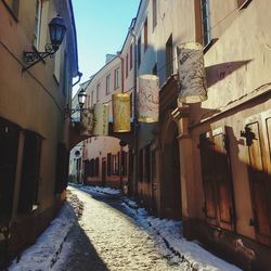 Alley amidst buildings in town