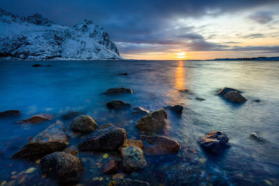 Scenic view of sea against sky during sunset