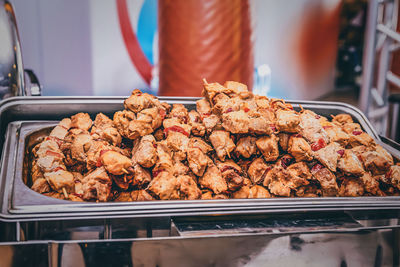 High angle view of meat on barbecue grill