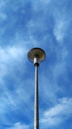 Low angle view of street light against sky