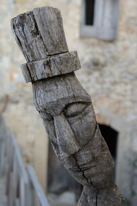 Low angle view of old wooden sculpture