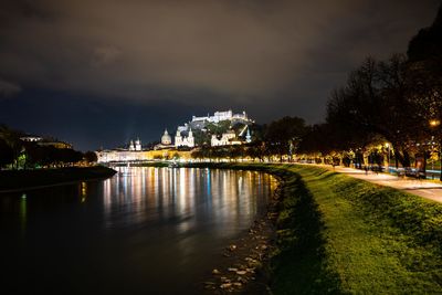 Illuminated buildings at waterfront